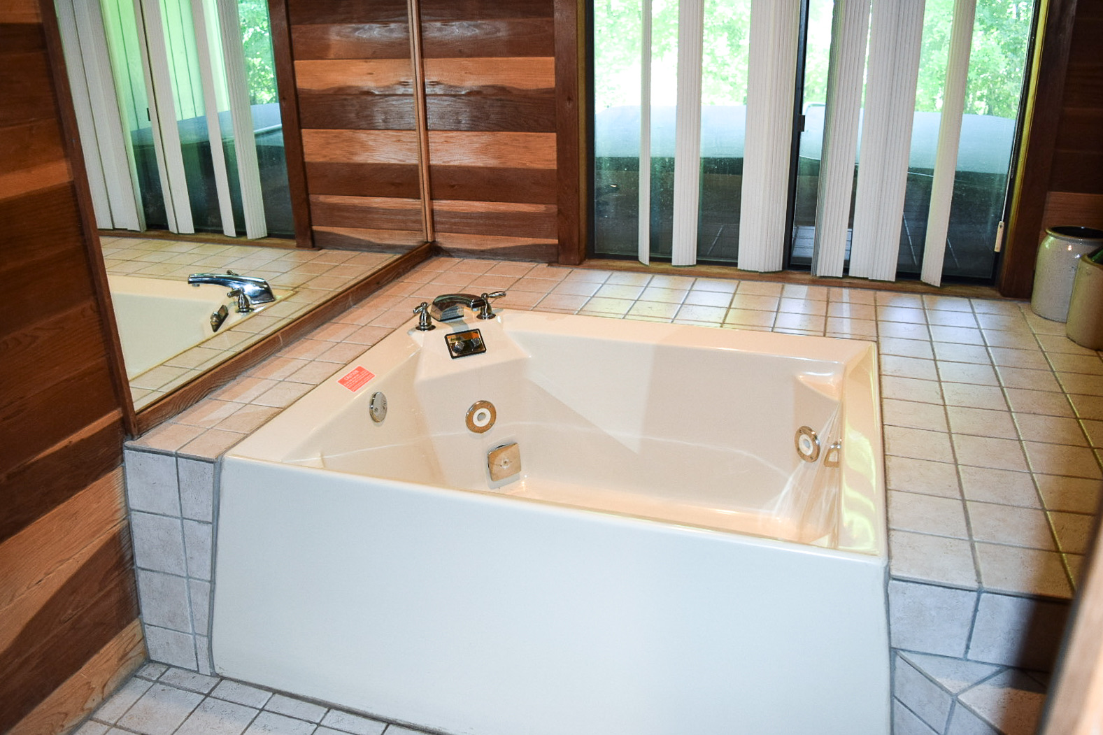 The jetted soaking tub in the cedar room